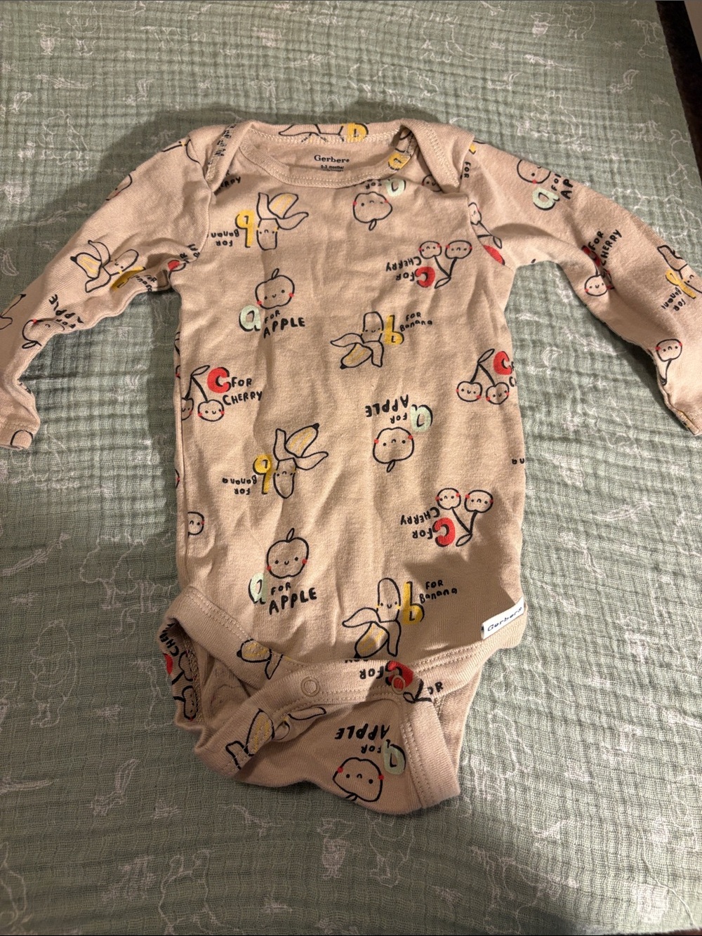 Gerber Beige Fruit Print Long Sleeve Bodysuit with Red & Yellow Accents